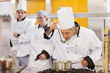 Chef tasting his students work