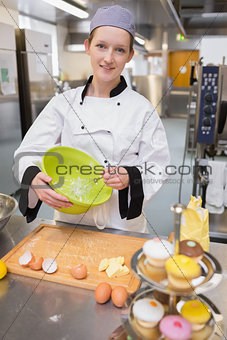 Pastry chef whisking egg whites