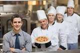 Waiter standing in front of Chef's