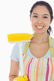 Smiling woman with broom