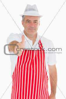 Happy butcher giving thumbs up