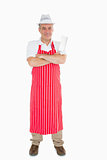 Butcher in apron with meat cleaver