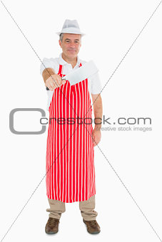 Butcher showing his meat cleaver