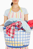 Woman holding basket of laundry