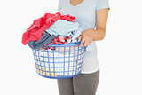 Woman holding a laundry basket