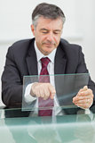 Business man scrolling on a virtual screen