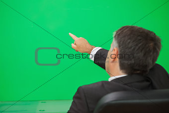 Man pointing to copy space