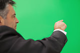 Businessman pointing to copy space