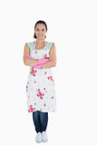 Woman wearing apron and rubber gloves