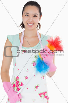 Woman holding a duster