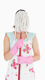 Woman hiding her face with a mop