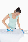 Woman ironing a shirt