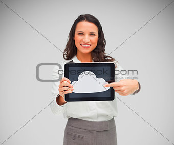Businesswoman holding a tablet computer with cloud symbol