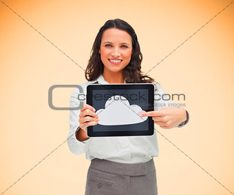 Woman pointing to cloud symbol on her digital tablet