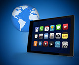 Tablet pc with applications against blue background