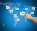 Hand selecting email from world map interface