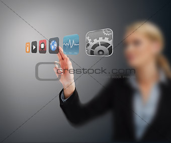 Businesswoman selecting application