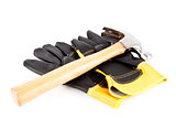 Two builder's gloves and a hammer