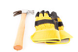 Pair of builder's gloves and hammer