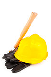 builder's gloves hammer and hard hat