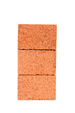 Carefully stacked bricks