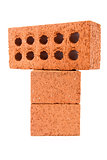 Three clay bricks being stacked