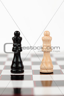 Queens standing at the chessboard