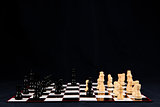 Chessboard against black background