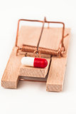 Pill in a mousetrap