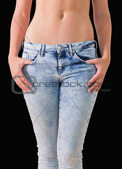 Woman holding her jeans