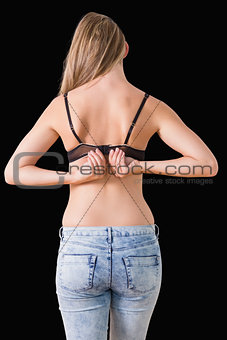 Woman closing her bra