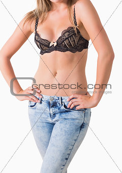 Woman touching her jeans