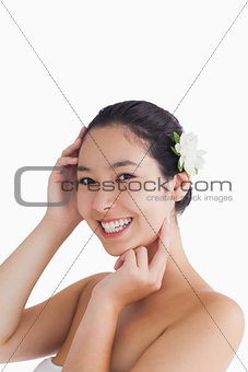 Woman touching her face
