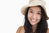 Smiling woman with a straw hat