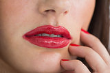 Close-up of woman having red lips
