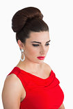 Woman wearing red dress and looking away