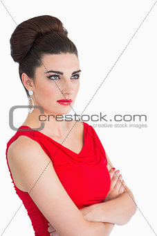 Woman having arms crossed and looking up