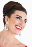 Woman with beehive hairstyle laughing