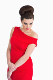 Woman with red dress looking glamorous