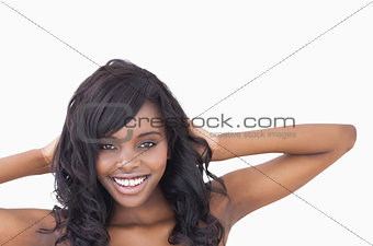 Woman hands at her hair
