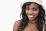 Woman wearing summer hat while smiling