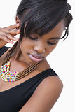 Woman posing in tribal style necklace