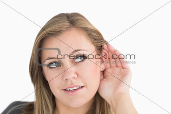 Woman making the sign of listening