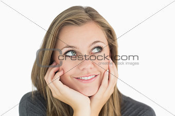 Thoughtful woman smiling