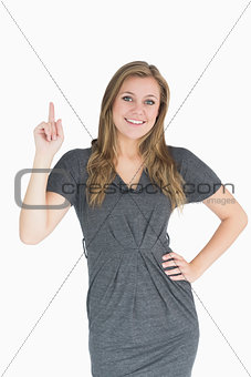 Blonde woman pointing the finger