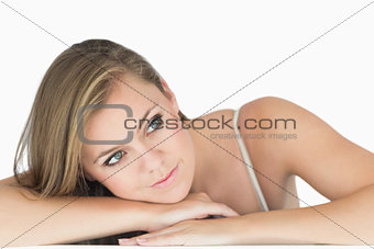 Blonde woman leaning and looking away