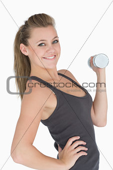Woman lifting dumbbell