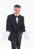 Waiter waiting with opened arms