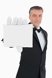 Waiter holding a card