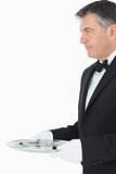 Waiter with a larger silver tray